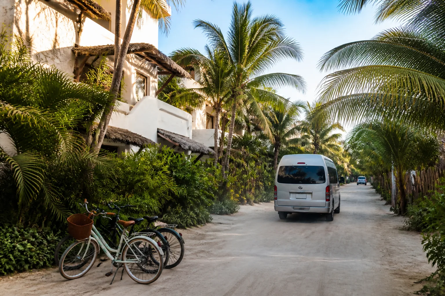 Tropical beach road serving boutique hotels in Tulum