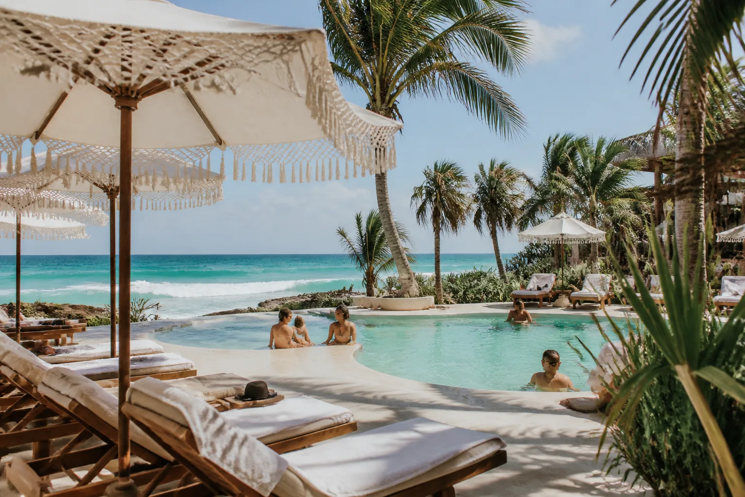 Pool and loungers at a Tulum beach club